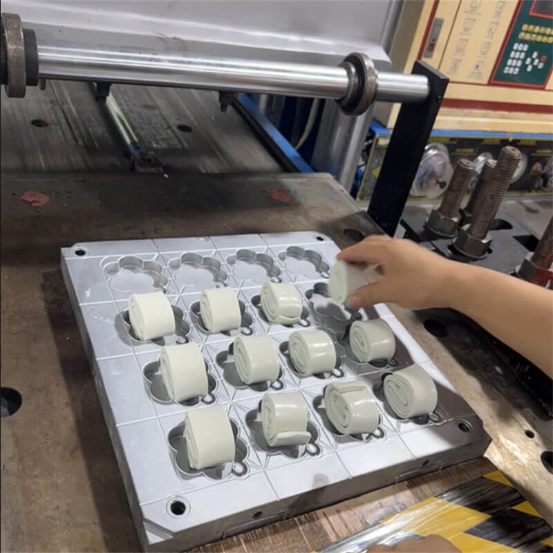 Loading the Silicone Charge into the Mold - Silicone Compression Molding Process 